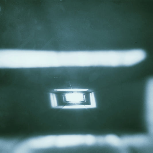 A bright light at the end of a white tunnel