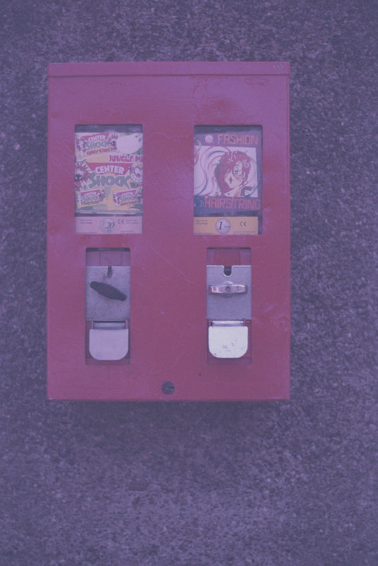 pink and white wall mounted switch