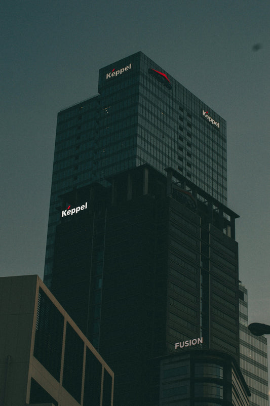 a very tall building with a sky background