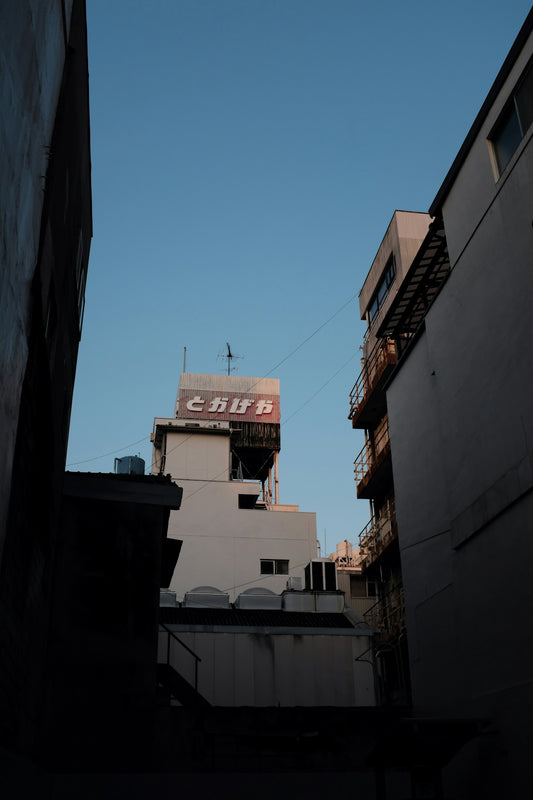 white high-rise building under blue sky