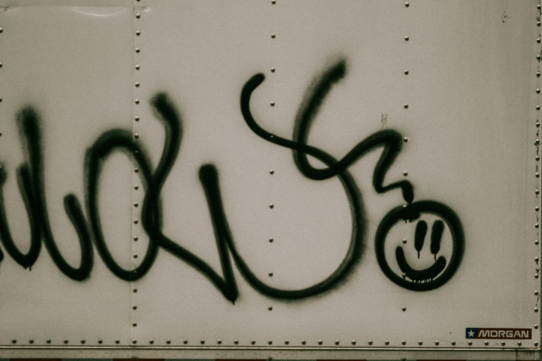 a close up of graffiti on the side of a train