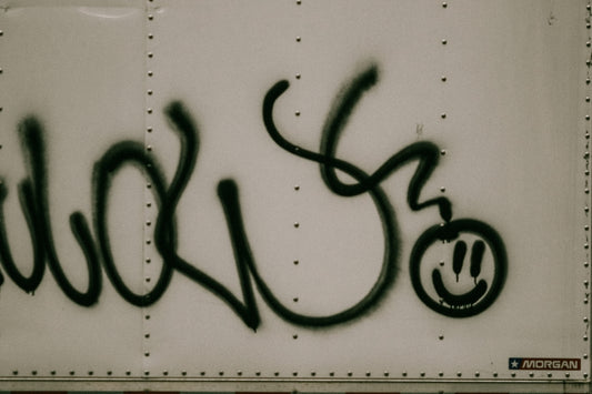 a close up of graffiti on the side of a train