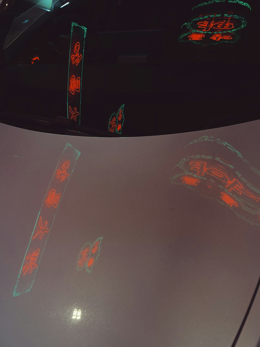 a close up of the hood of a car