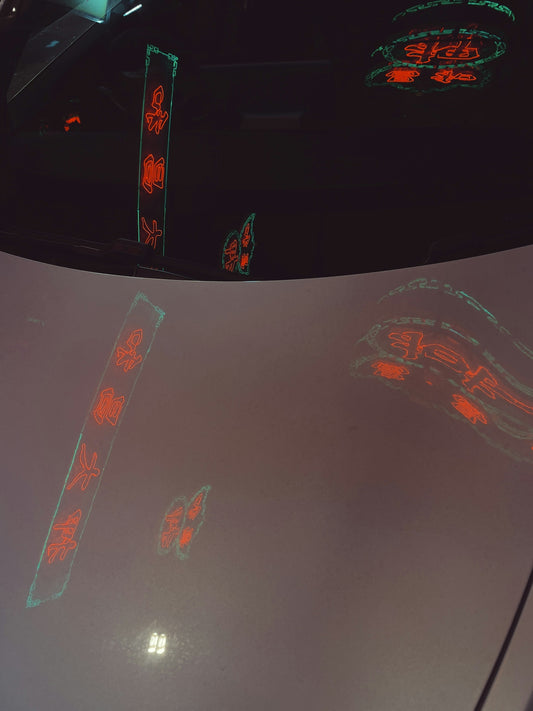 a close up of the hood of a car