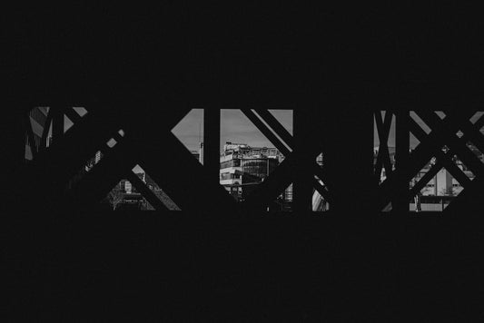 a black and white photo of a bridge