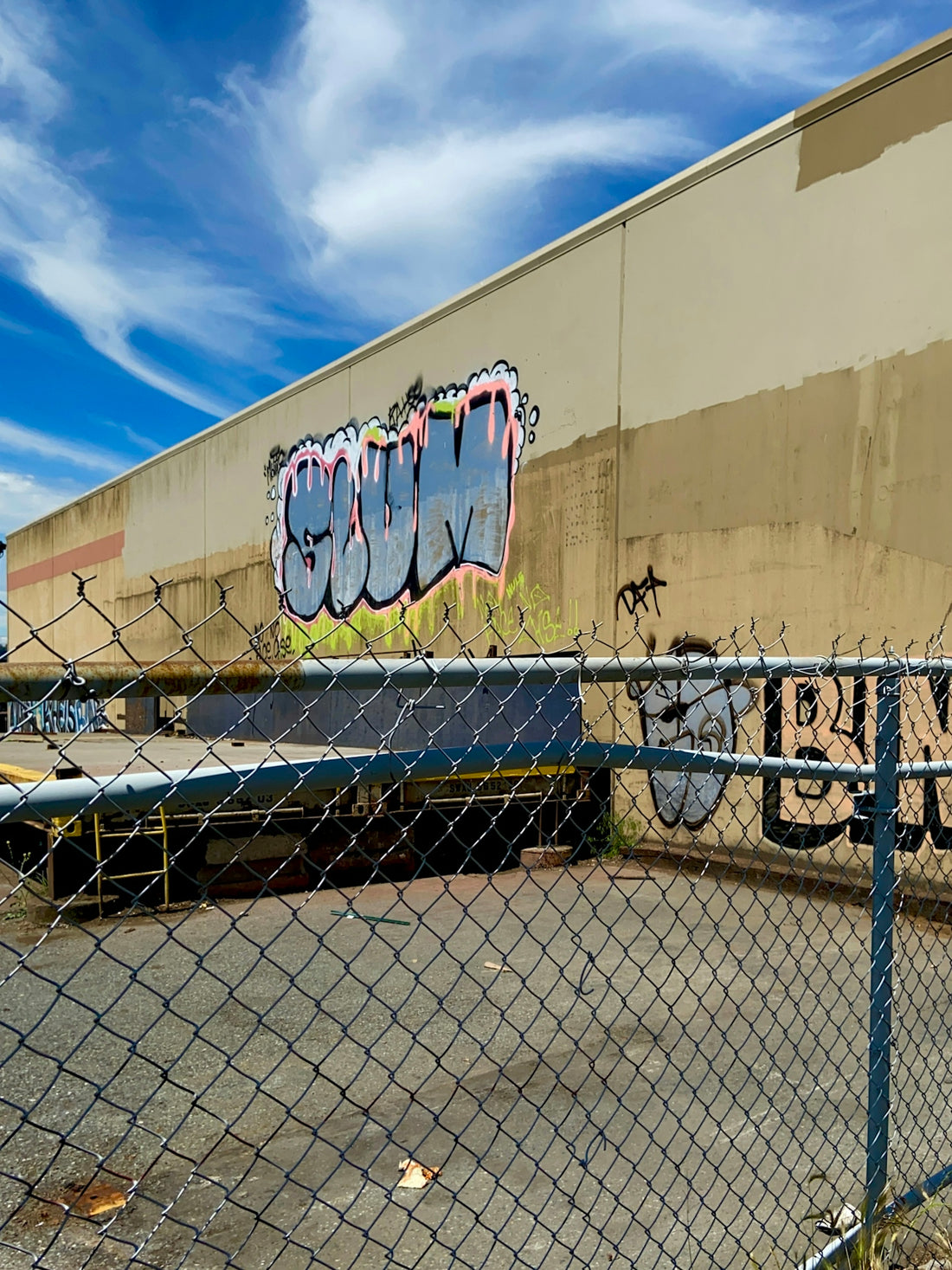 a large building with graffiti on it