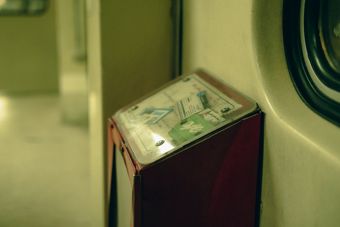 a red refrigerator freezer sitting next to a dryer