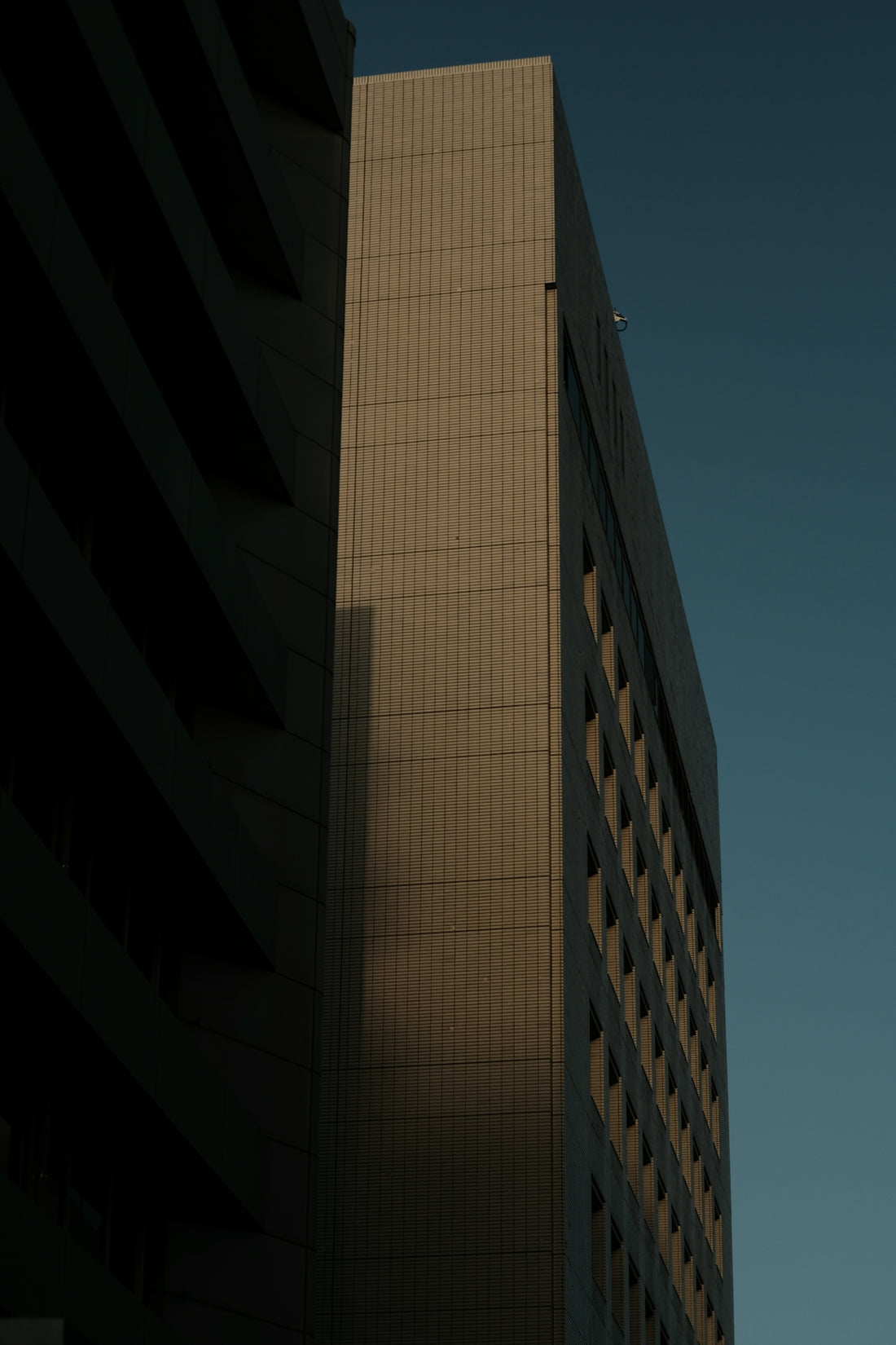 a tall building with a clock on the side of it