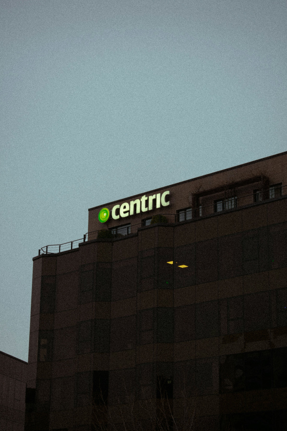 a large building with a sign on top of it