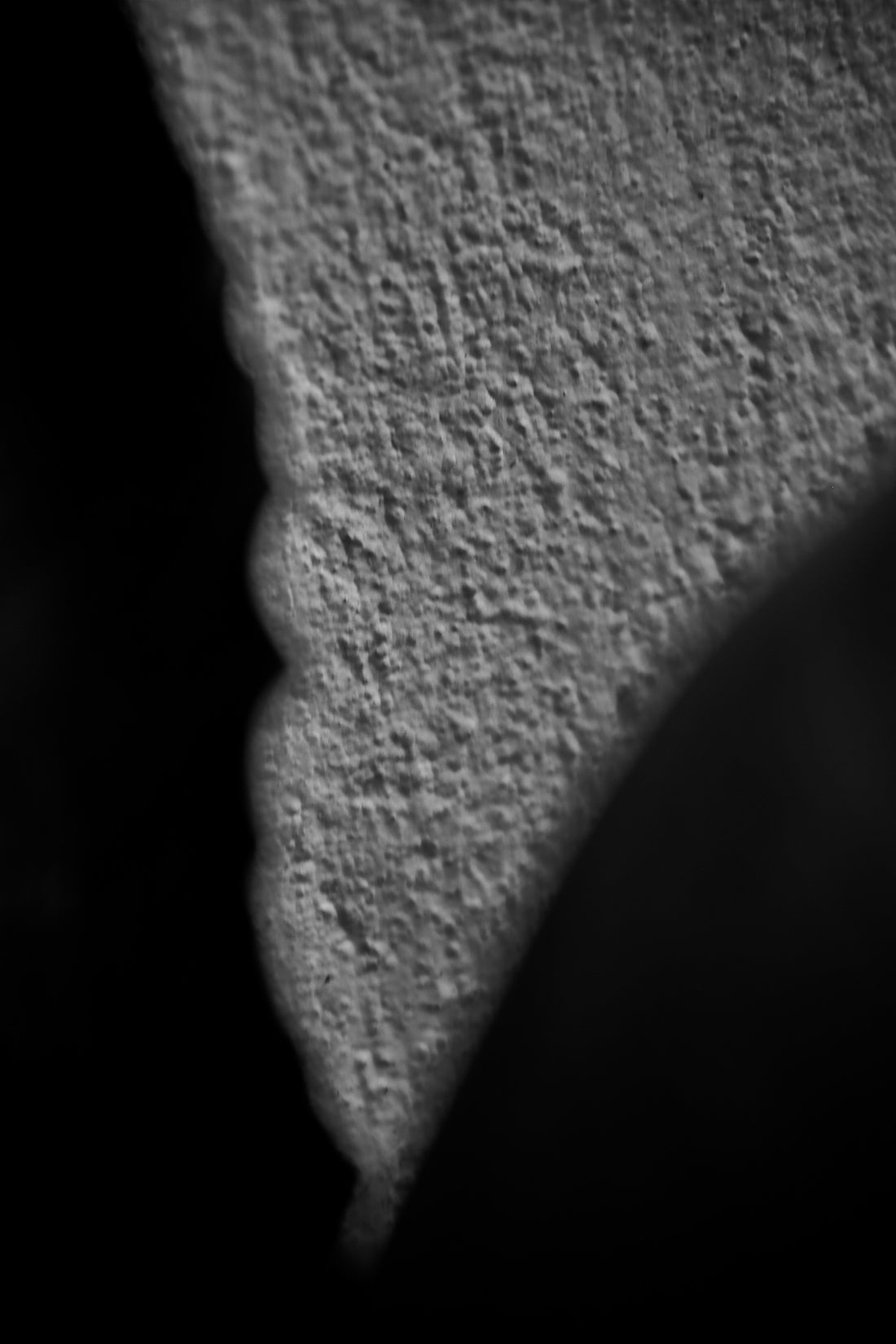 a black and white photo of a person's shadow