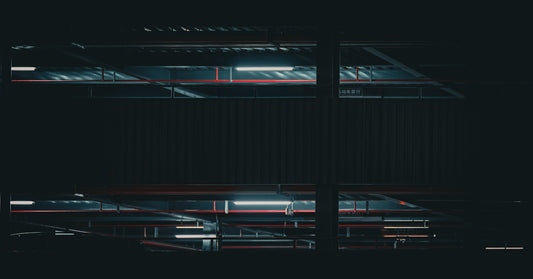 A black and white photo of a window in the dark