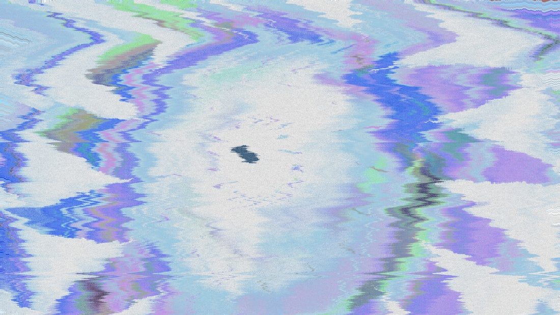 Abstract blue and white pattern swirls in a circle.