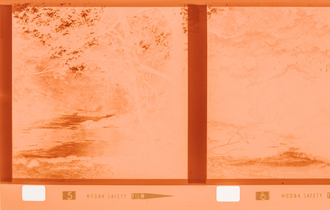 Two frames of vintage film with orange tint